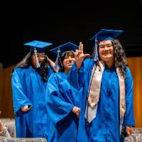 Students processing.